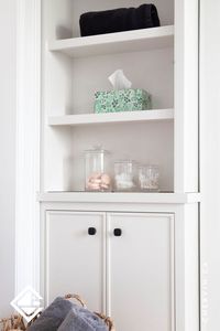 Custom cabinetry is the perfect solution to fit your space and needs perfectly. Consider this custom bathroom storage cabinet with open shelving as an example. Tailor-made to fit this home bathroom precisely, this storage cabinet is both chic and functional. Open shelving to aesthetically display, and hidden storage for storing your bathroom belongings!...#BathroomCabinet #BathroomStorage #StorageCabinet #StorageIdeas