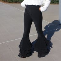 Super Stacked Flared Black Pants. Long Leg Pants Into Wide Layered Flare. Layered Light Weight Material.