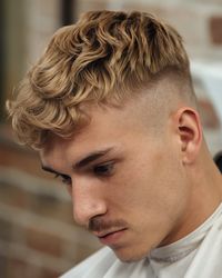 Discover the top new haircuts for men 2025, featuring 22 trending styles like high fades, low fades, mullet, and undercut looks. Whether you’re looking for the best cuts for curly hair, round faces, or want a fresh beard style, these cuts will suit every man. Explore new hairstyles for Indian, long hair, and short cuts. Stay on trend with new men's haircuts and popular haircuts for men that define the year.