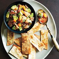 Serve this salsa with chips, or spoon it atop sautéed chicken breast or fish. If you want to make the salsa ahead, omit the cilantro and avocado, and stir them in just before serving. If you find blood oranges, substitute them for regular oranges for seasonal color.