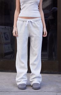 Experience the epitome of cozy chic in the Light Gray Anastasia Waffle Knit Sweatpants from John Galt. Crafted with a stylish waffle knit fabrication for extra warmth, these sweatpants combine comfort and style and feature an interior drawstring waistband, wide-leg openings, and a relaxed fit.    	Solid color sweatpants 	12" rise 	30" inseam 	20" leg opening 	Mid-rise 	Waffle knit fabrication 	Interior drawstring waistband 	Wide leg openings 	Relaxed fit 	Side hand pockets 	1