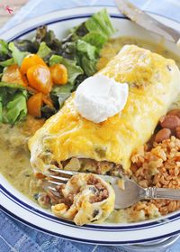 A recipe for smothered green chile burrito. Filled with a zesty beef and potato mixture and smothered with green chile sauce and cheese.