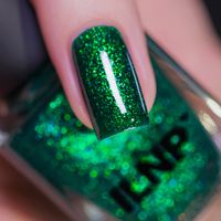 Good Fortune is a radiant emerald green shimmer nail polish. Good Fortune's luxurious emerald green is further enhanced by a vivid green shimmer that effortlessly catches the light. A statement of class, Good Fortune's jelly-leaning base allows each layer of polish to build an incredible depth that will keep your gaze all through the night! Good Fortune is part of the NYE Collection, a party of 6 uniform shimmer formulas in fun and festive shades. Inspired by the fun that accompanies lasting mem