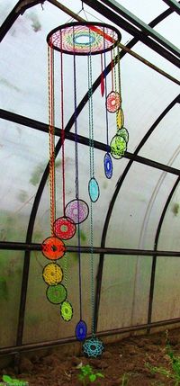 Another unique dream catcher. Instead of feathers and other trinkets hanging, here it’s little dream catchers. And of course the strings follow the rainbow for colorful dreams ahead.