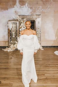 Elevate your bridal style with this sophisticated off-the-shoulder wedding gown from Ava Laurenne Bride. Featuring statement long sleeves, a fitted silhouette, and a modern yet timeless design, this dress is perfect for the fashion-forward bride. Make a stunning statement on your wedding day! Elegant bridal gown, off-shoulder wedding dress, long sleeve wedding gown, minimalist bridal fashion, modern wedding dress, sophisticated wedding look, couture bridal style, timeless wedding elegance. Visit Ava Laurenne Bride to find your dream wedding gown! @arliquinn