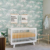 Sun & Surf in @emilygoswick's breezily beautiful nursery, where her little one's imagination can be as boundless and free-flowing as the waves 🌊 Featuring our beloved #babyletto Hudson 3-in-1 Crib in White, the perfect neutral statement piece against a dramatic accent wall 🌟