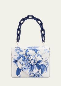 "Find OSCAR DE LA RENTA Tro Flower Leather Crossbody Bag on Editorialist. The Oscar de la Renta \"Tro\" crossbody bag features a flower printed leather construction with a flower hardware accent. It includes a chunky chain top handle and a chain crossbody strap. The bag can be worn as a top handle or crossbody and features a flap top. It measures approximately 5.3\"H x 6.7\"W x 3.1\"D and was made in Italy."