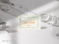 These wavy edged vintage style place card settings are easy to edit to create table setting cards for your guests. They feature a trendy retro scallop design and with a handwritten font. You can also edit and change the ribbon color, font, font color, and background color to better match your event.   Find the matching solid scallop edge wedding bundle here and save an extra 25% by purchasing our bundle!  https://www.etsy.com/uk/listing/1284499028/wedding-bundle-templates-scallop-wavy?click_key=