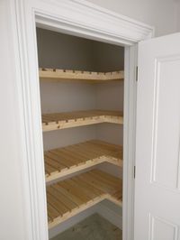 Built in airing cupboard slatted shelves that I made