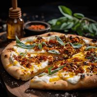 Napa Home Chef | This easy-to-make pizza is topped with creamy burrata, fresh basil, sweet honey, and spicy chili flakes. It's the perfect summer pizza! Savor Napa, Bite by Bite.