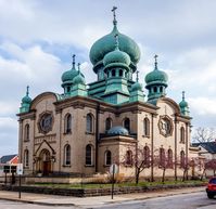 St. Theodosius Russian Orthodox Cathedral is considered one of the finest examples of Russian church architecture in America, and it is the mother church of all Orthodox parishes in Ohio. Designed by Cleveland architect Frederick Baird, St. Theodosius is adapted from the Cathedral of Christ the Savior in Moscow . The Moscow church also serves as the model for the Russian Orthodox Cathedral of the Transfiguration of Our Lord (1922) in Brooklyn, New York.