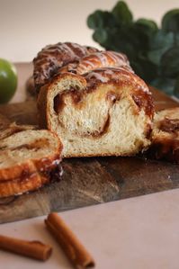 Apple pie meets tender brioche dough in this braided bread topped with a buttery cinnamon glaze. Eat plain, serve warm with ice cream, or use as the most amazing baked french toast! This is the perfect fall bread recipe for any occassion!