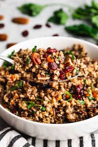 This Wild Rice Pilaf is a colorful and flavorful side dish perfect for fall, Thanksgiving, or Christmas! Made with wild rice, sautéed veggies, pecans, craisins, and fresh parsley, it’s sure to impress.