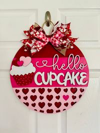 We absolutely love cupcakes and Valentine’s Day so this door hanger is our new favorite!! This door hanger is vibrant and beautiful! It’ll be your favorite too for years to come! Most items are made to order, so please allow two weeks for us to create your item especially for you. Bow fabric may vary slightly from the photo.