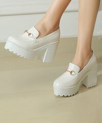 White Link-Accent Platform Loafer - Women. Designed with goldtone link accents and an elevated silhouette, these platform loafers are an easy choice for finishing your looks. Smooth-to-the-touch uppers. 3.5'' heel with 1.2'' platformPull-onMan-made upperMan-made liningRubber soleImported