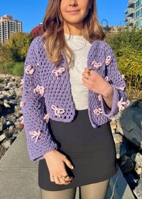 The Evie Cardigan is a beautiful and flowy crochet cardigan with adorable bow appliques! Pattern is written in US crochet terminology. The printable PDF includes details of materials, abbreviations, gauge/sizing when applicable, and detailed instructions for crochet and assembly. PDF is in English only.