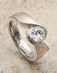 Customized here in our Summer Mokume Gane and a round white diamond solitaire, how would you customize yours? See our many options by choosing your metal, mokume and stone!