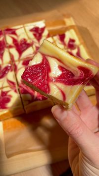 Raspberry Lemonade Cheesecake Bars are like biting into sunshine! A buttery, crisp graham cracker base topped with a zesty lemon cheesecake and vibrant raspberry swirl. As pretty as they are delicious, these bars are perfectly tart, sweet, and full of summertime flavors.