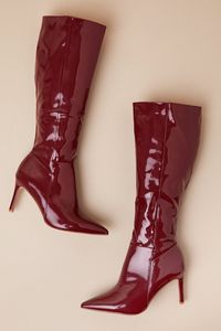 All your favorite cold weather looks will be even better this season with the Silva Red Patent Pointed-Toe Knee-High Boots! Sleek faux patent leather shapes these must-have boots that feature a classic pointed-toe upper, a seamed vamp, and a 14"" knee-high shaft with a 14.5"" circumference. 8"" zipper at the instep. Flirty stiletto heel completes the chic design! 3. 25" wrapped stiletto heel. Lightly cushioned insole. Rubber sole has nonskid markings. Man made materials. Imported. Lulus | Silva