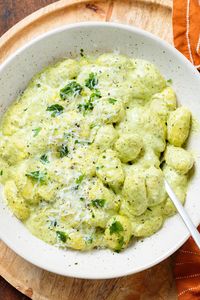 These one pan Creamy Pesto Gnocchi are the perfect dinner for a busy weekday! They're made in one pot and can be ready in under 15 minutes! They're made with creamy goat cheese pesto sauce and store bought gnocchi. They're creamy, flavorful, and fresh.