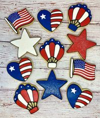 "Having a 4th of July bash?  No party is complete without our adorable, thematic party favor cookies! Each measuring approximately 3\", our party favor cookies are offered in sets of 12, and come individually bagged and bowed. This listing is for (12) cookies in any or all of the following designs:    American Flags, Patriotic Stars, Flag theme Hearts, Red, White, and Blue Hot Air Balloons We do not use added preservatives, so all items are made to order.  Unless you request otherwise, your orde