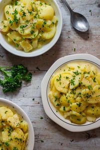 Authentic German potato salad is easy to prepare and uses only little ingredients. It's essential that you use high quality broth in your dressing.