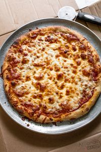 Skip the Dominos Pizza Menu and make Dominos Pizza dough at home! All you need is a mixing bowl, 6 main ingredients, and a goodie bag (secret ingredients!) This pizza dough recipe out beats all the other pizza crust recipes and is made like the pizza Dominos is known for!  #bestpizzadoughrecipe #Dominospizza