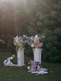 Floral pillar ceremony arrangement wedding 