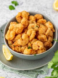 A restaurant appetizer favorite, these Popcorn Shrimp are easily made at home. They're golden, crispy, delicious, and the perfect bite!