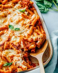 Baked ziti with ricotta is Italian comfort food at its finest! This easy recipe is simple to bake up and feeds a crowd. #bakedziti #ziti #pasta #bakedpasta #easydinner #dinner #dinnerideas