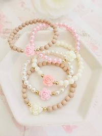 Lovely Roses Beaded Bracelet Made with acrylic roses, gold plated beads and acrylic pearl beads  Wear alone or stacked with other favorite pieces