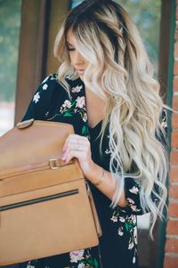 Never thought I'd say I like roots but I totally love this grown out color! A good alternative to the overdone ombré trend!