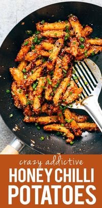 Crispy Honey Chilli Potatoes are a super addictive snack - fried potato fingers are tossed in a sesame honey chilli sauce that's sweet and spicy and will give you sticky fingers that you'll be licking.