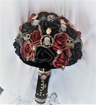 Victorian Gothic Wedding Flower Bouquet-Alternative Wedding-Skull Wedding-Day of the Dead-Renaissance Wedding-Fantasy Wedding-Game of Thrones This large and showy Bouquet will go with many different Wedding Themes Gothic, Victorian Steampunk, Victorian Renaissance, Victorian Gothic, Renaissance, Medieval Renaissance, Skull Weddings, Halloween..You name it..it works Made with 30 True Touch roses in Deep Black, and Blood Red/Burgundy Hand painted roses All around the Bouquet are Brass...