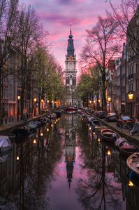 I woke up to a beautiful sunrise in Amsterdam at this spot. For about five minutes, the sky lit up with beautiful purple hues. The calmness of the water made for a perfect reflection. #fstoppers