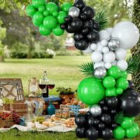 Transform your party with our Stunning Green and Black Balloon Garland! Perfect for any occasion, Summer parties, Birthday parties, jungle-themed or not, our kit includes everything you need to take your décor to the next level. Assemble the balloons to create a masterpiece that will wow everyone. The striking colour contrast will impress, and tying each one is a true labour of love. Get your order in now and show off your one-of-a-kind creation! Balloons are made from Natural Latex and are biod