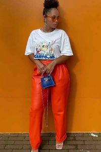 Orange Faux Leather Pants are for the woman that wants to feel confident and look fierce. They will add a bold flare to any wardrobe while still keeping it classy. These pants are beautiful with its gorgeous bright pop of color, comfortable material and sleek design..