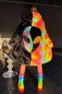 Space Island's Area 51 Coat in Rainbow is a must-have piece of outerwear for any fan of cosmic fashion. It's made from the softest long-haired faux fur and fully lined with two side pockets and a hood featuring an eye-catching rainbow and black alien face. This product is Ready-to-Ship, Final Sale and there will be No