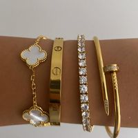 Elevate your style with our Gold Luxury Bracelets Set. Clover Crystals & Tennis Bracelet. Perfect for her. Shop now!