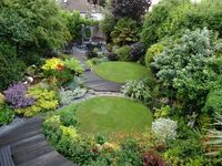 Circular lawns draw eye to the centre of the garden.