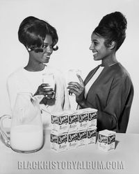 GOT MILK! 1964 ... Two unidentified African American teenage girls featured in an ad promoting June (1964) as dairy month. Charlotta Bass / California Eagle Photograph Collection, University of Southern California, Los Angeles, CA, 1964.