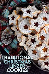 Christmas is all about tradition, both the new traditions and the old. This Traditional Christmas Linzer Cookies recipe, an old world cookie confection, originating in Austria, is a vital part of holiday traditions for many families. Also, they look impressive, but they are so simple to make! #linzer #traditional #christmas #holiday #baking #cookies