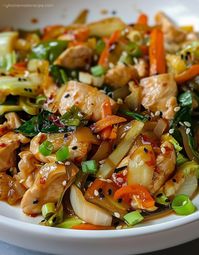 Explore the delightful fusion of crunchy cabbage and tender chicken, all brought together with a savory, umami-rich sauce in our Chinese Chicken Cabbage Stir-Fry. It's a symphony of flavors that makes every bite memorable.