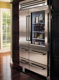 Modern appliances. Big Fridge. Stainless steel. I like the glass door. Lacks an ice/water panel.