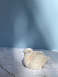 Welcome to our Etsy shop! We are excited to introduce our stunning swan candle, perfect for weddings and as a thoughtful wedding favor.  Our swan candle is meticulously handcrafted with love and attention to detail. It features a graceful swan design, with intricate feathers and elegant curves, making it a beautiful addition to any wedding decor. The candle is delicately scented with a subtle fragrance, creating a soothing ambiance for your special day. Each swan candle is made from high-quality