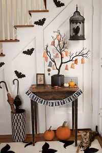 25 Ideas To Style Your Console Table With Spooky Halloween Decorations