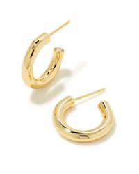 Meet your new collection staple: the Colette Huggie Earrings in Gold. Our fan-favorite Colette Hoops have been reimagined in a minimalist huggie style for a wear-anywhere look. Wear them solo or stacked to achieve effortless sophistication. Metal 14k Gold Over Brass Closure Ear Post Size 0.71" outside diameterDue to the one-of-a-kind nature of the medium, exact colors and patterns may vary slightly from the image shown. | Kendra Scott Colette Huggie Earrings in Gold | Metal