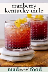 Use this Cranberry Kentucky Mule recipe to make a delicious cranberry Moscow mule at home with bourbon instead of vodka. Top your bourbon mule with a piece of candied ginger for an extra fancy at home cocktail.