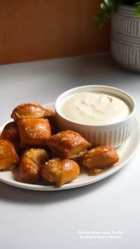 These pretzels are made with pizza dough! Super easy to make, and extremely delicious! The cheese sauce is just out of this world, plus high protein!