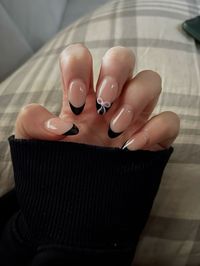 black french tip nails with bow